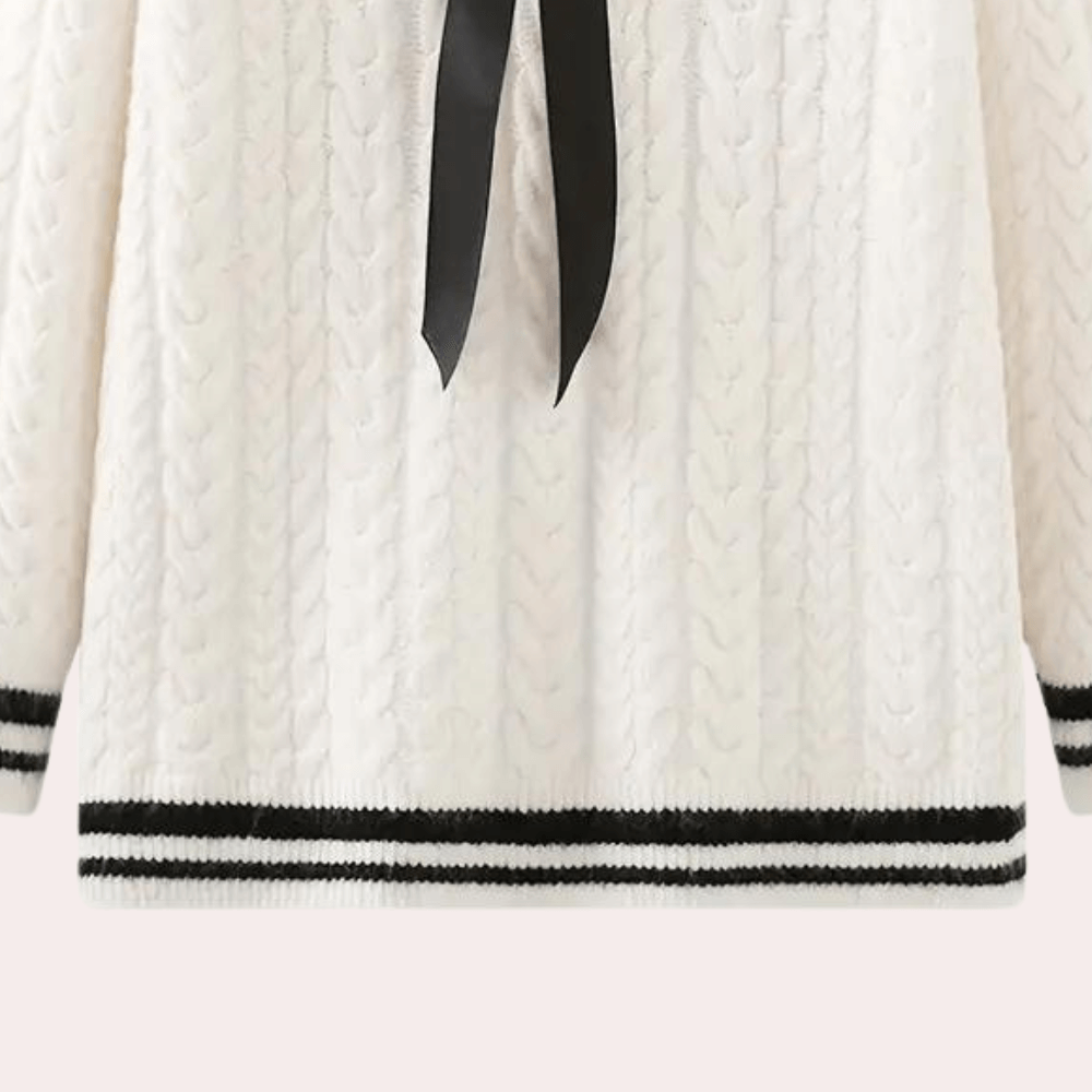 Elegant long sleeve women's sweater, a soft and cozy knit for ultimate winter comfort.
