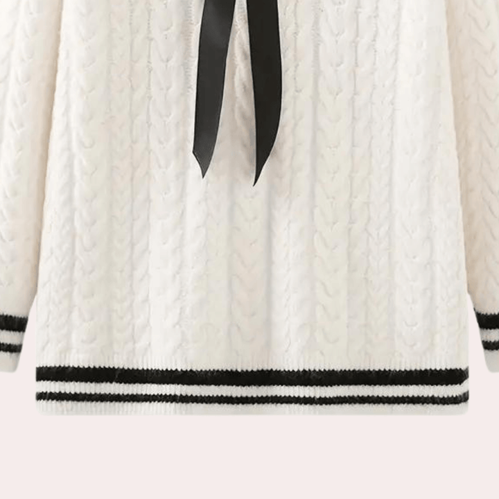 Elegant long sleeve women's sweater, a soft and cozy knit for ultimate winter comfort.