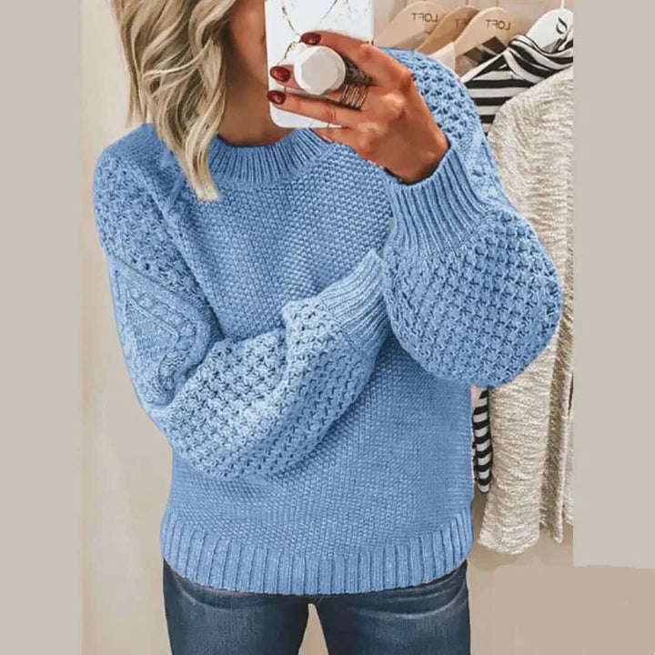 Women's cozy knitted long sleeve sweater. Soft knit for autumn & winter casual wear.