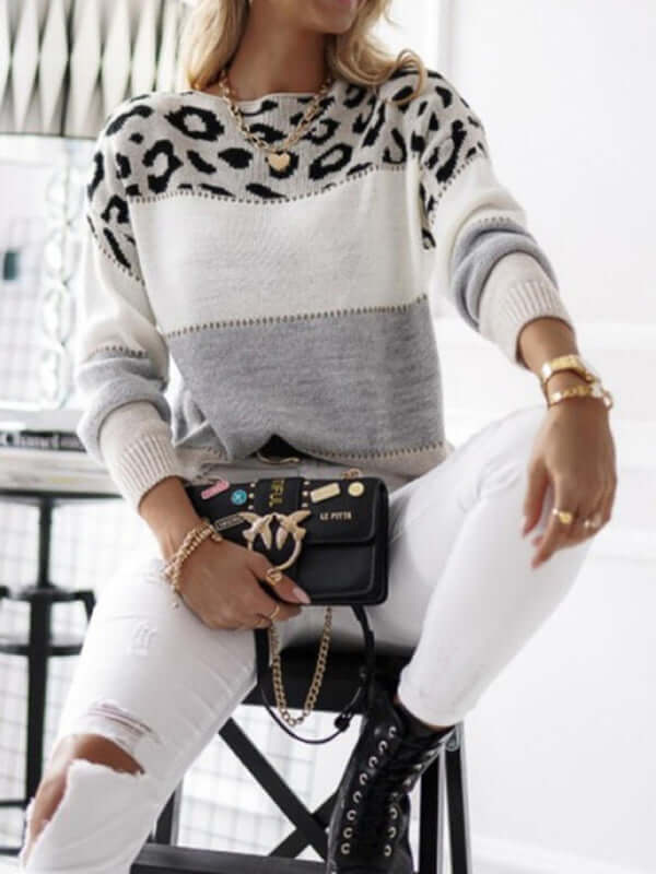 Women's cozy leopard print knitted jumper. Relaxed fit, long sleeve sweater for stylish winter fashion & casual wear.