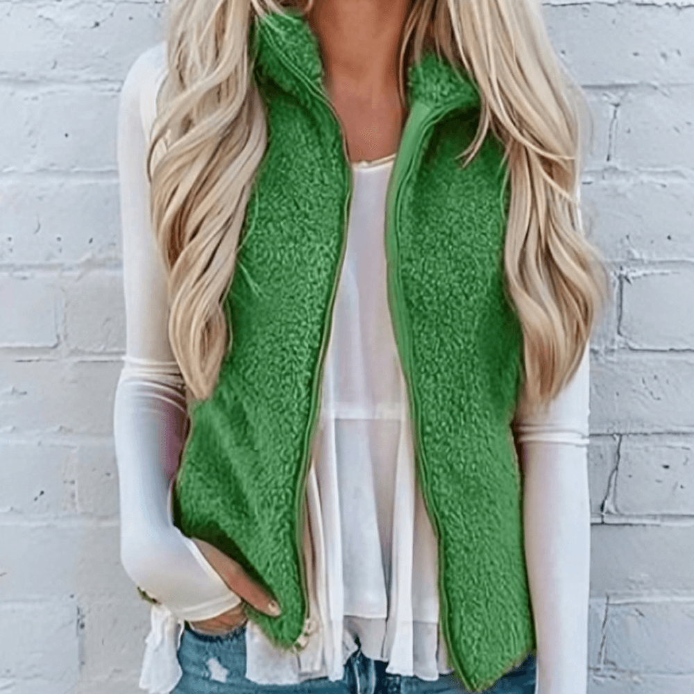 Women's cozy lightweight knitted cardigan in light grey, featuring practical pockets & an open front for casual layering.