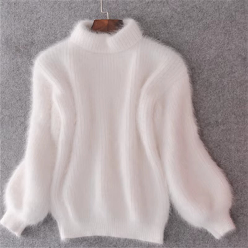 Comfortable women's high-neck knit sweater, loose fit, perfect for warm winter and fall styling.