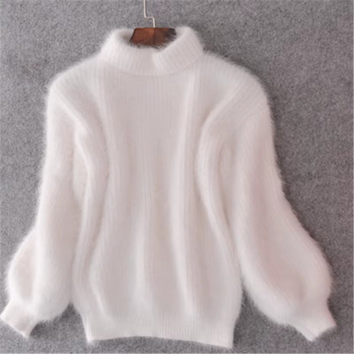 Comfortable women's high-neck knit sweater, loose fit, perfect for warm winter and fall styling.