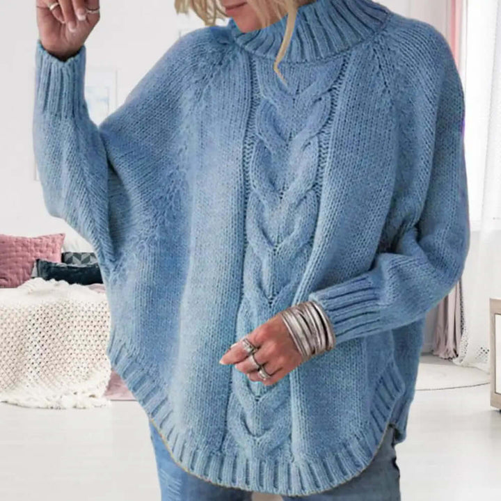 Women's cozy loose-fit knitted turtleneck sweater in a warm winter style, perfect for comfortable casual wear.