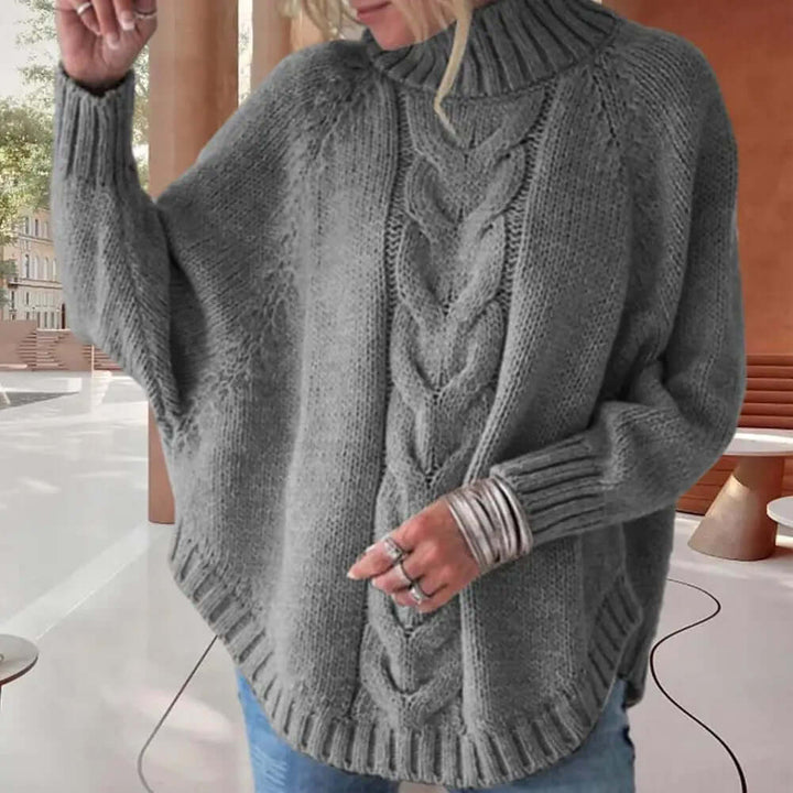 Soft knit women's pullover sweater with a loose fit and warm turtleneck, ideal for winter fashion & comfort.