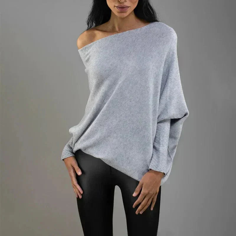 Elegant women's solid knit sweater with a relaxed fit, ideal for effortless everyday style.