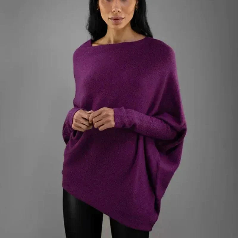 Premium women's loose sweater in a solid color, offering a cozy feel and versatile styling for all seasons.