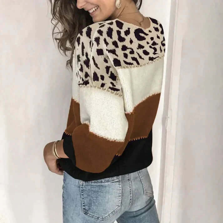 Comfortable brown loose knit sweater for women, featuring a round neck and versatile fall fashion for effortless style.
