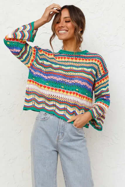Women's cozy loose knit jumper in cream. Perfect for effortless fall & winter style. Comfortable pullover sweater.