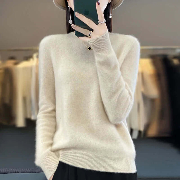 Cozy women's Merino wool pullover, a warm long-sleeve top for winter fashion.