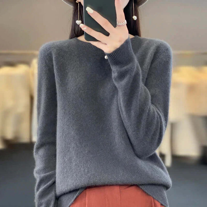 Natural fiber O-neck Merino wool sweater for women, offering warmth and breathability.