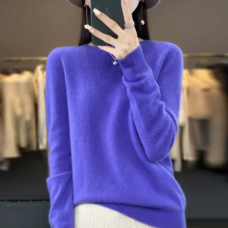 Elegant O-neck Merino wool pullover for women, a cozy long-sleeve essential.