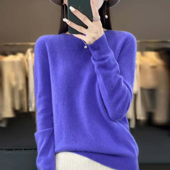 Elegant O-neck Merino wool pullover for women, a cozy long-sleeve essential.