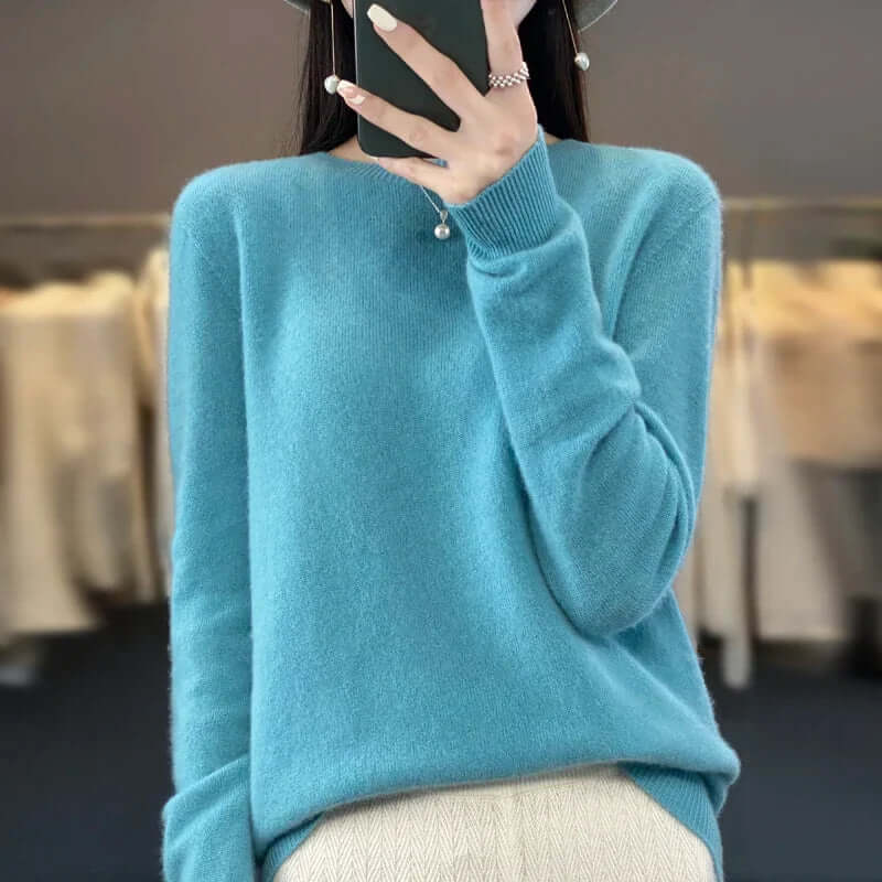 Soft O-neck Merino wool jumper for women, ideal for layering and winter comfort.