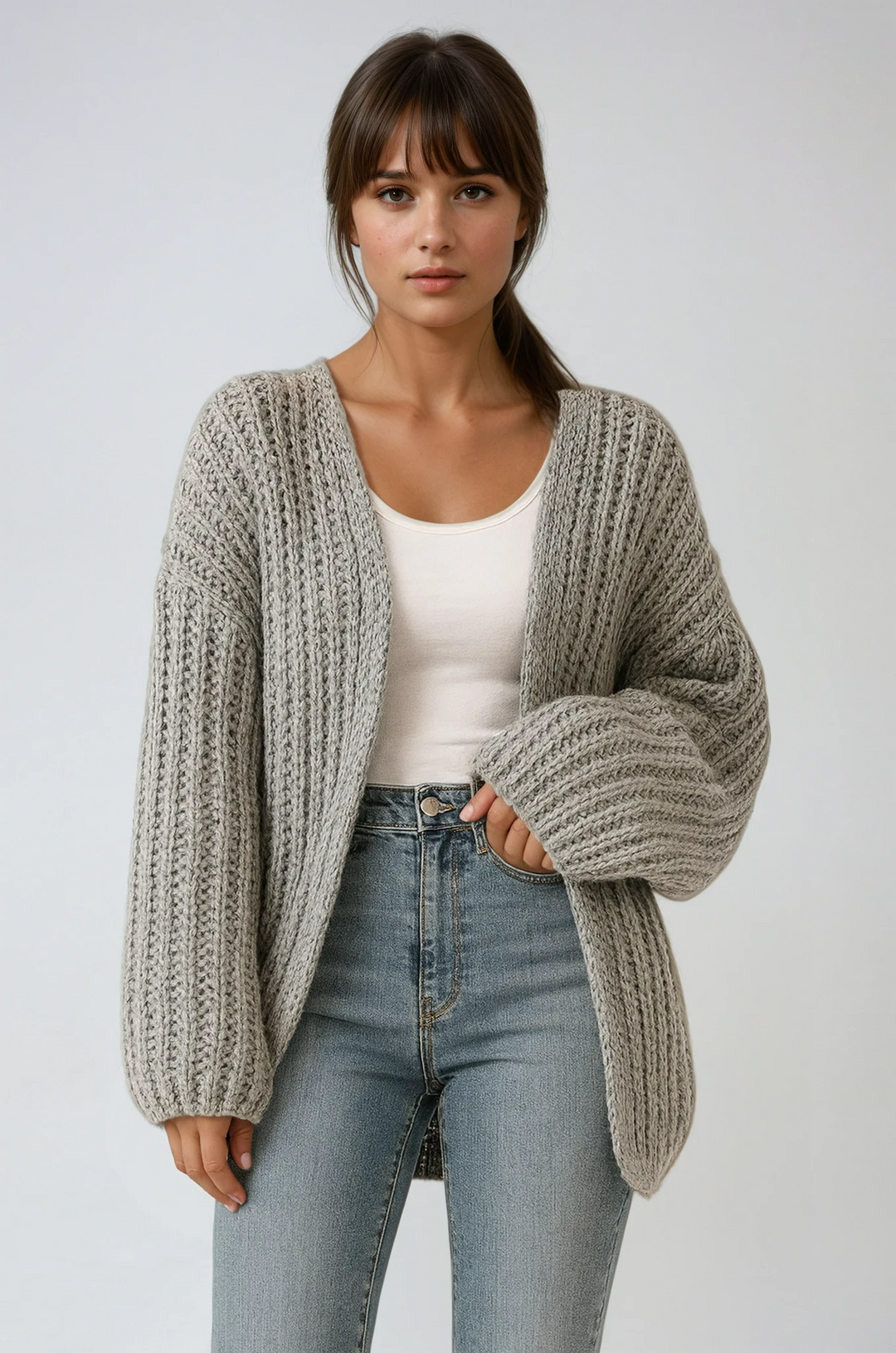 Women's cozy open-front cardigan with oversized lantern sleeves. Soft chunky knit, perfect for autumn & winter layering.