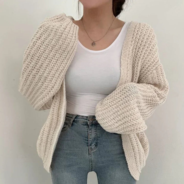 Casual women's oversized open-front cardigan with relaxed fit & cozy chunky knit. Great for everyday layering.