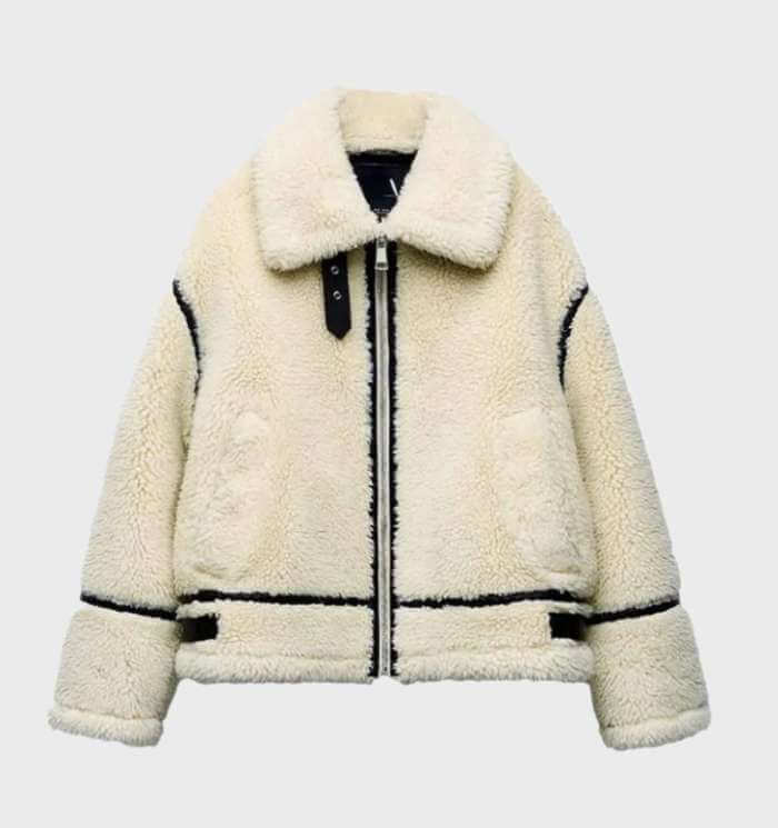 Stylish women's oversized beige fleece zip jacket. Trendy and warm outerwear, ideal for casual fall & winter layering.