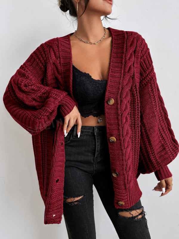 Chic women's oversized cable cardigan. Cozy knit, relaxed fit, perfect for comfortable autumn/winter fashion.