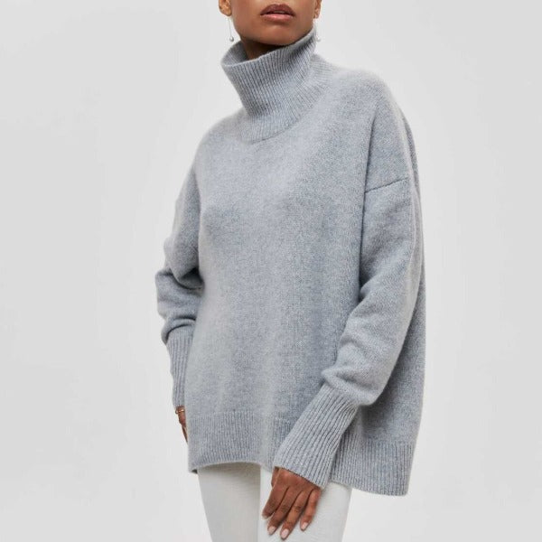 Stylish women's oversized knit turtleneck sweater, perfect for cold fall & winter days. Casual long sleeve fit.