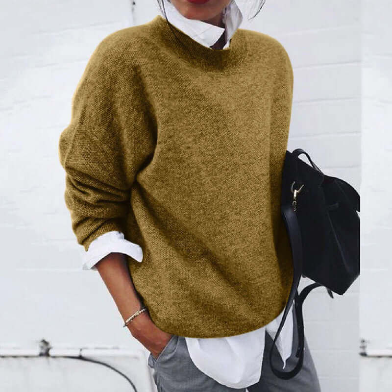 Comfortable women's long-sleeve oversized knitted sweater, a soft top for relaxed everyday style.
