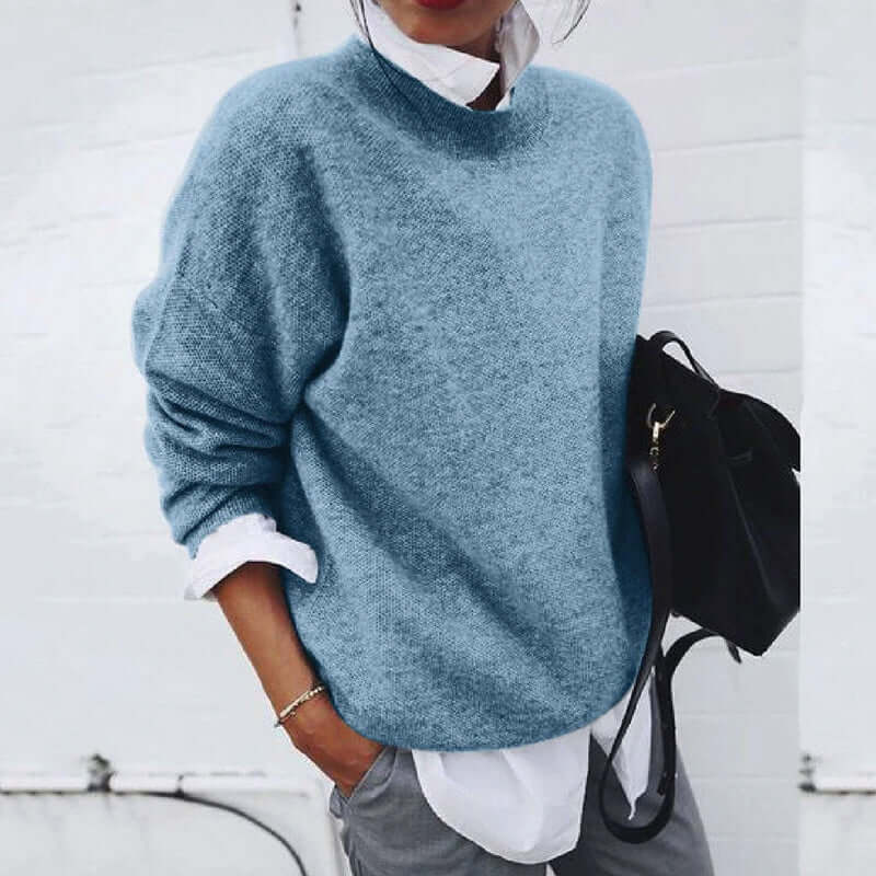 Stylish women's oversized knitted jumper in a soft, cozy fabric, perfect for effortless casual fashion.