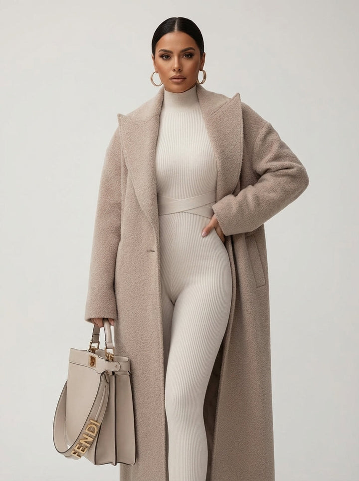 Chic women's oversized long coat, an elegant and versatile autumn fashion staple for warmth and sophisticated style.