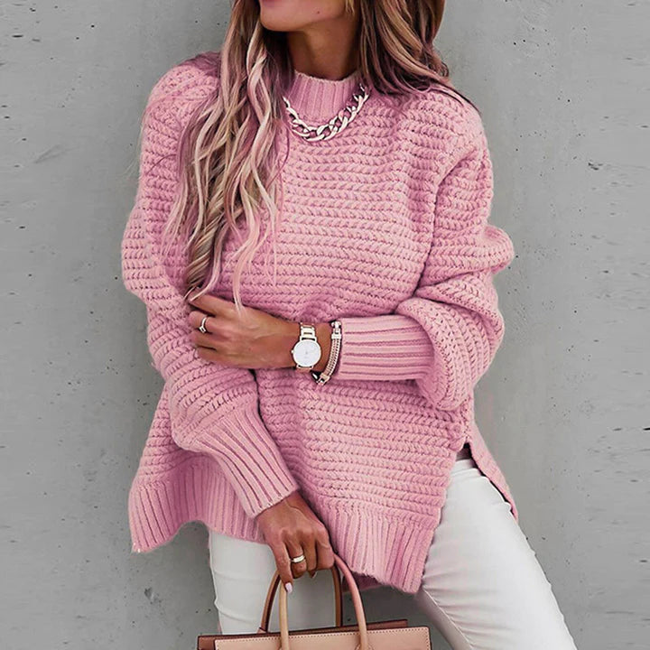 Cozy oversized long-sleeve women's knitted pullover sweater. Perfect for winter comfort, warmth, and stylish wear.