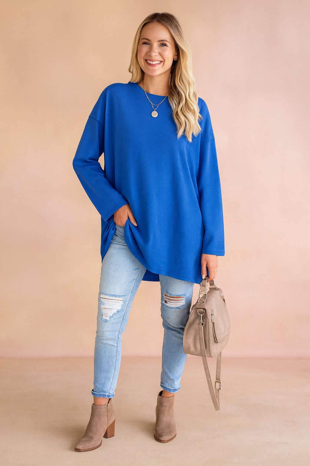 Chic women's oversized sweater, a cozy loose fit long sleeve top offering effortless casual style.