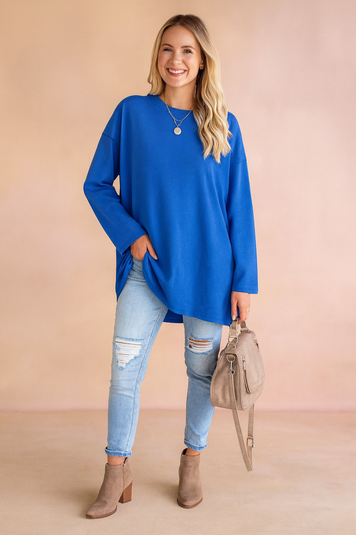Chic women's oversized sweater, a cozy loose fit long sleeve top offering effortless casual style.