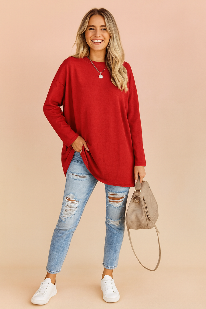 Versatile women's oversized long sleeve sweater, a stylish and cozy top for casual outfits.