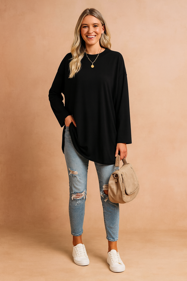 Soft and cozy women's oversized pullover sweater, a comfortable long sleeve top for cool weather.