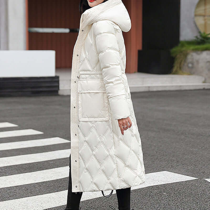 Stylish women's insulated hooded jacket, perfect for cold weather.