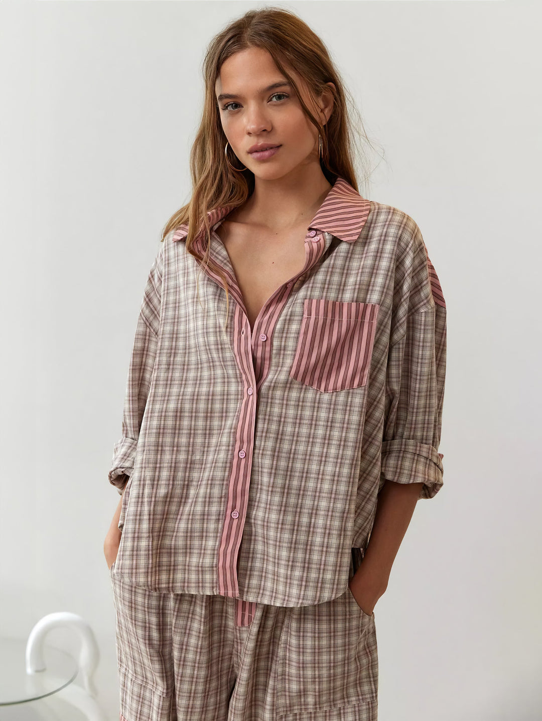 Comfortable women's plaid flannel loungewear shirt, ideal for relaxing at home.