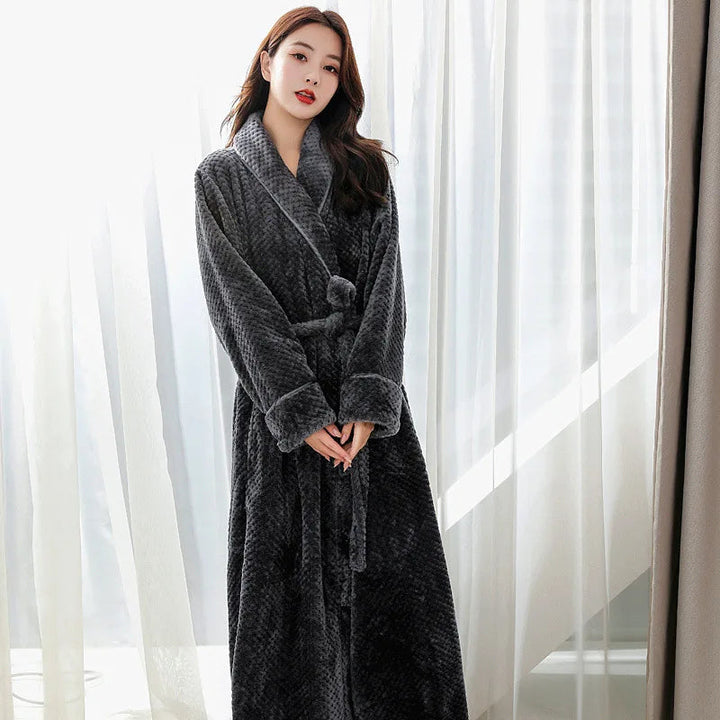 Comfortable women's plush bathrobe, perfect for lounging & relaxation at home.