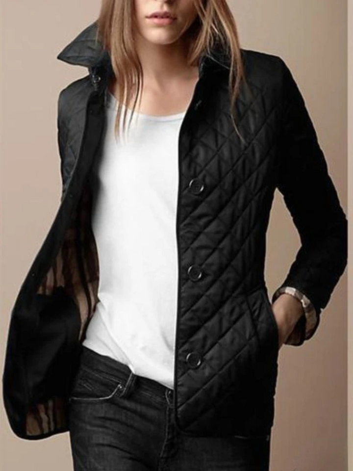 Women's cozy quilted jacket with stylish turned-down collar. Perfect fall & winter layering.