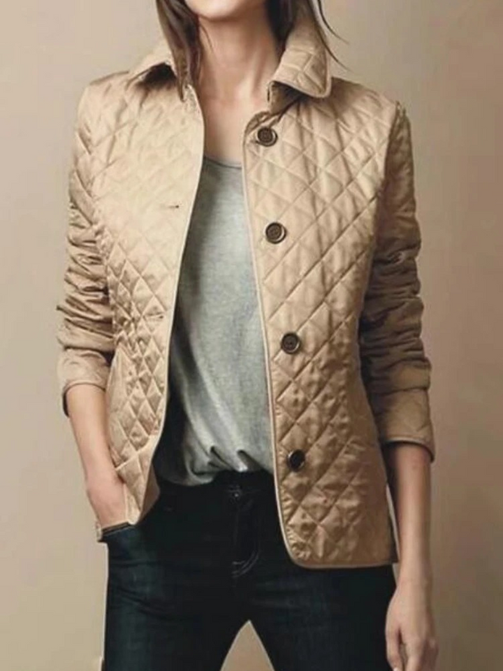 Casual women's quilted jacket with snap buttons & stylish turned-down collar. Ideal for everyday wear.
