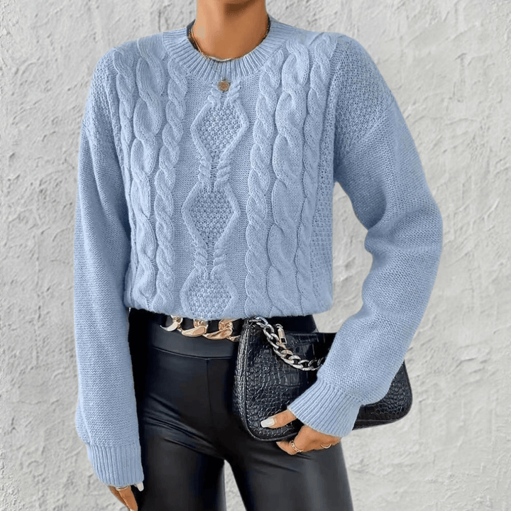 Women's cozy relaxed fit blue knit sweater for effortless style & comfort, perfect for fall & winter casual wear.