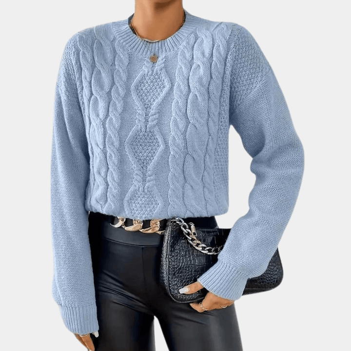 Versatile women's blue relaxed fit long sleeve sweater, a cozy knit top essential for casual fall & winter outfits.