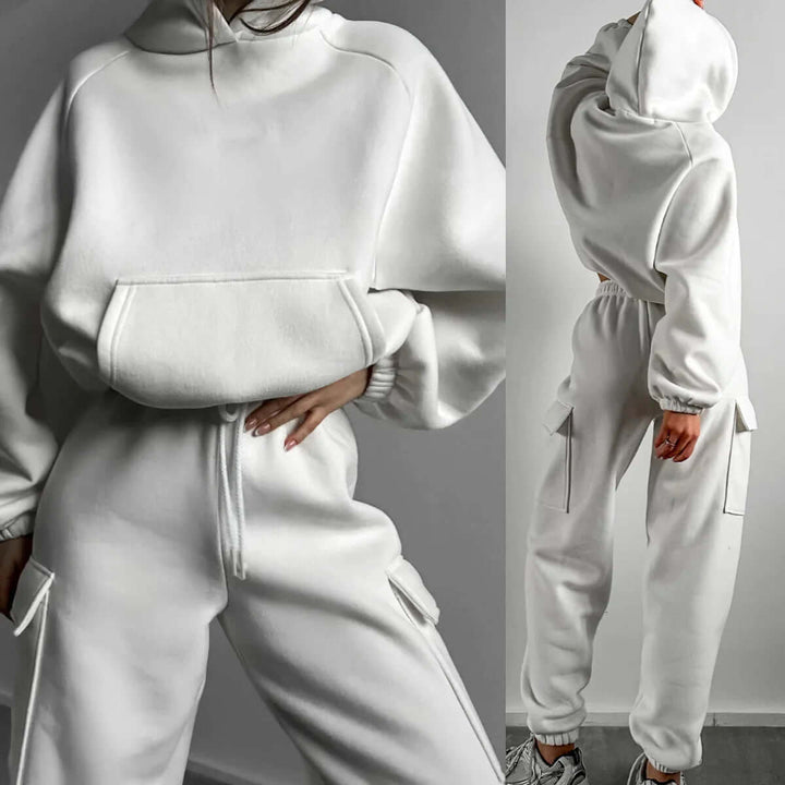 Neutral tone women's cozy relaxed fit hoodie and jogger set, a comfortable loungewear staple.