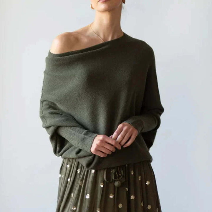 Soft knit women's relaxed fit sweater in a chic casual style. Ideal cozy autumn wear for everyday comfort.