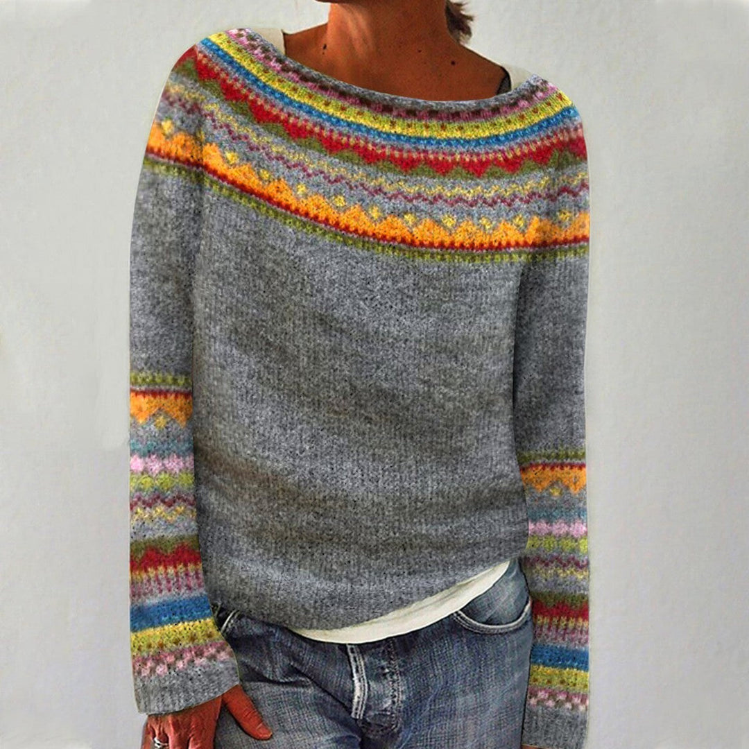 Stylish women's retro striped pullover sweater. Cozy long sleeve top for comfortable winter fashion.