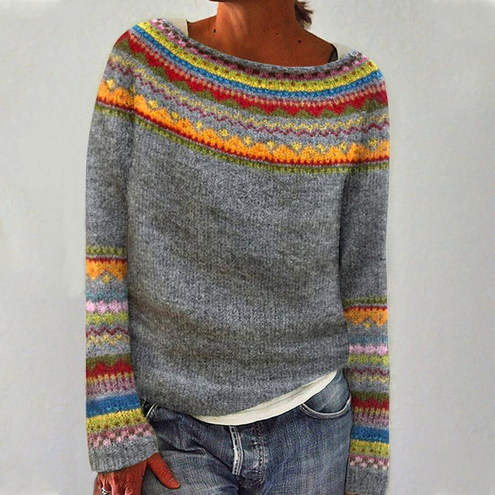 Stylish women's retro striped pullover sweater. Cozy long sleeve top for comfortable winter fashion.