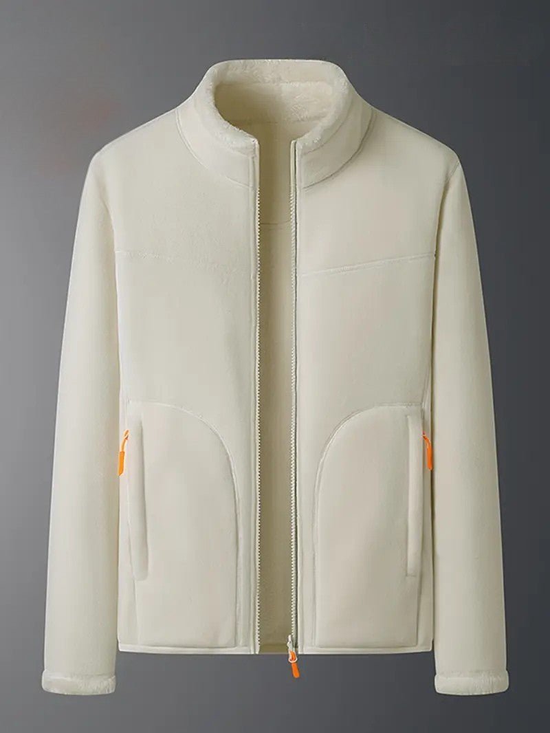 Neatly folded women's reversible winter jacket, cozy & warm, ready for stylish fall/winter wear.