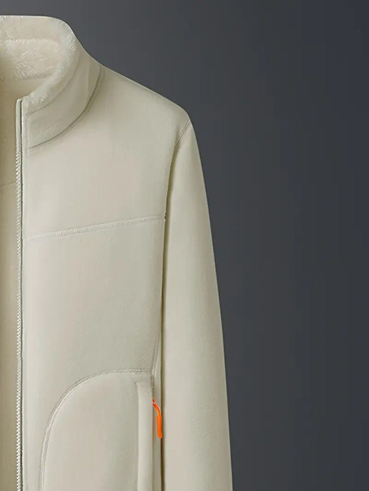 Woman showing the back of a cozy reversible winter jacket, casual & stylish for daily wear.