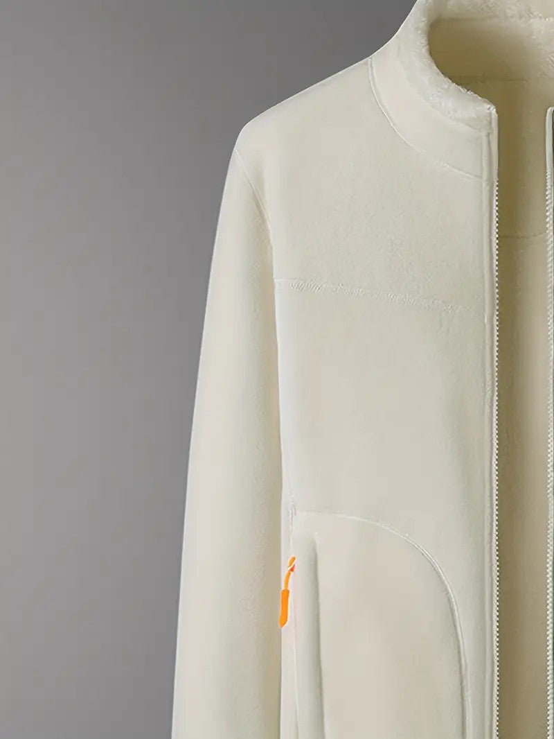 Angled view of a women's reversible winter jacket, stand collar & zip-up, perfect for cold weather.