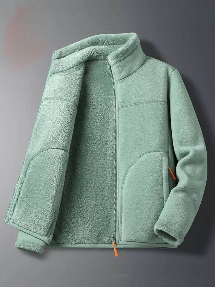 Detail of sleeve on a women's warm reversible winter jacket, ideal for fall/winter casual fashion.
