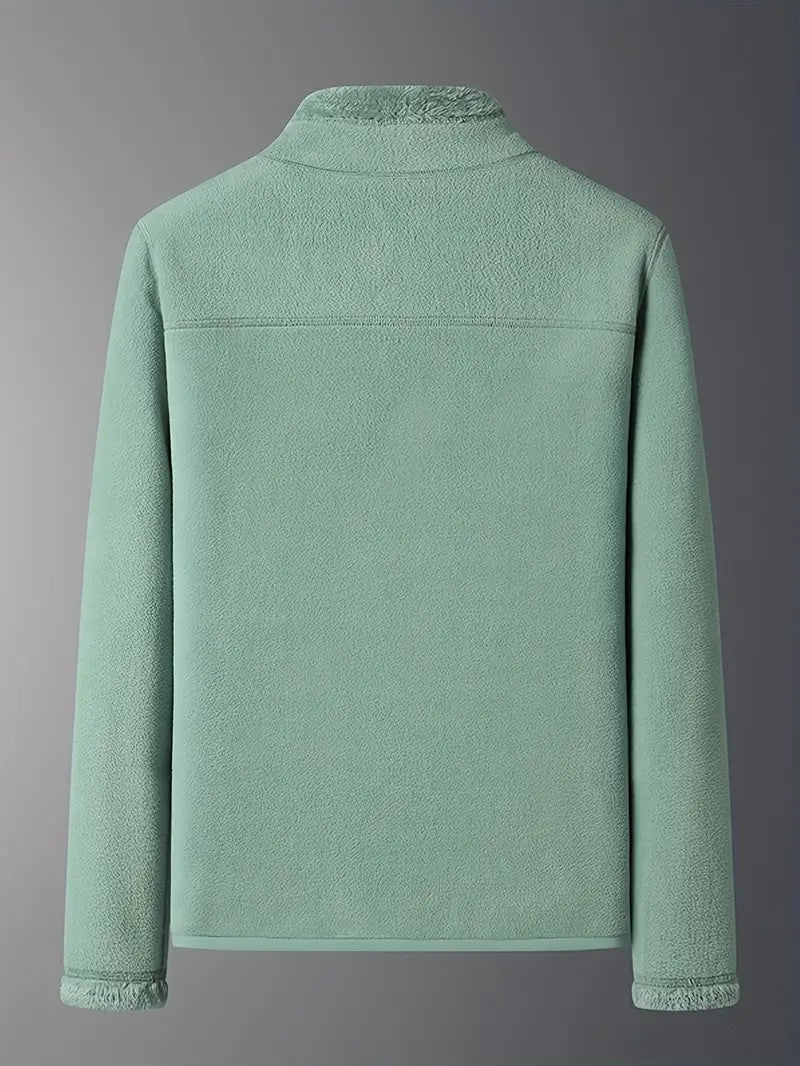 Functional pockets on a women's cozy reversible winter jacket, practical for daily winter wear.