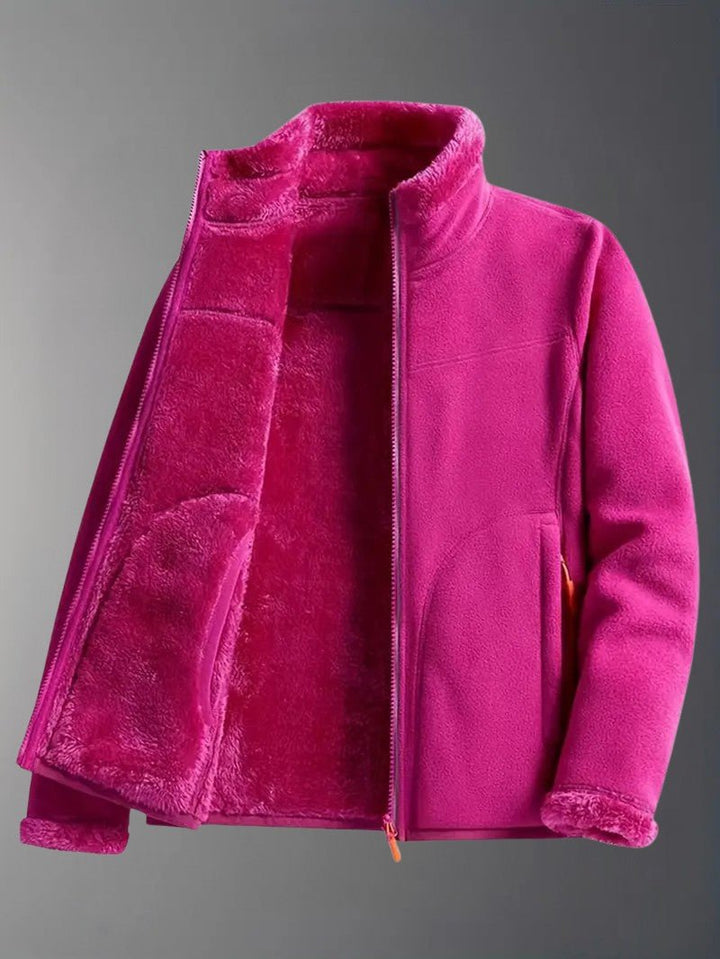 Other side of women's reversible winter jacket, laid flat, showcasing versatile stylish outerwear.