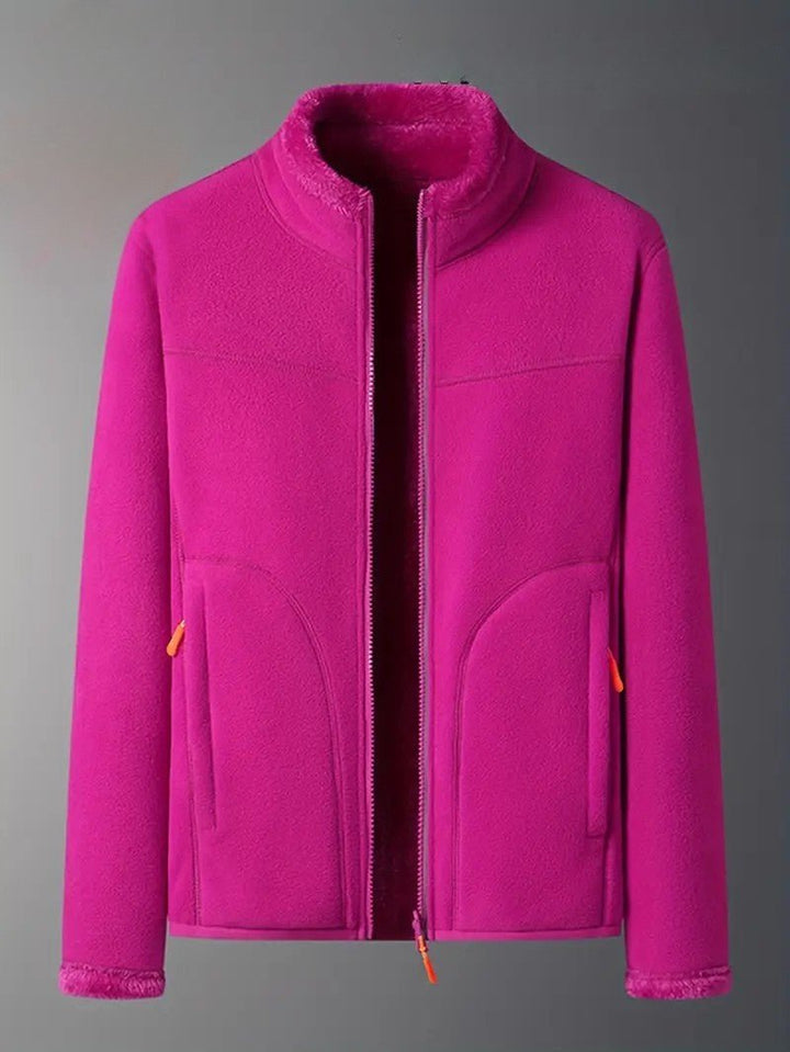 Happy woman in a cozy reversible winter jacket with stand collar, ideal for daily casual outings.
