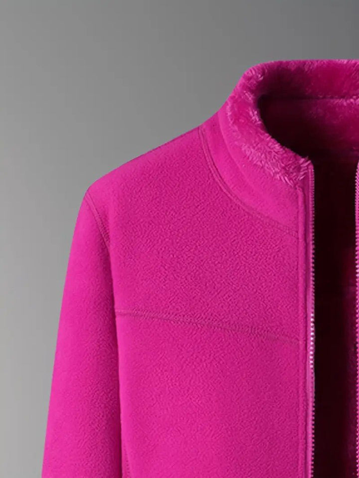 Interior view of women's reversible winter jacket, showing cozy lining & quality craftsmanship.